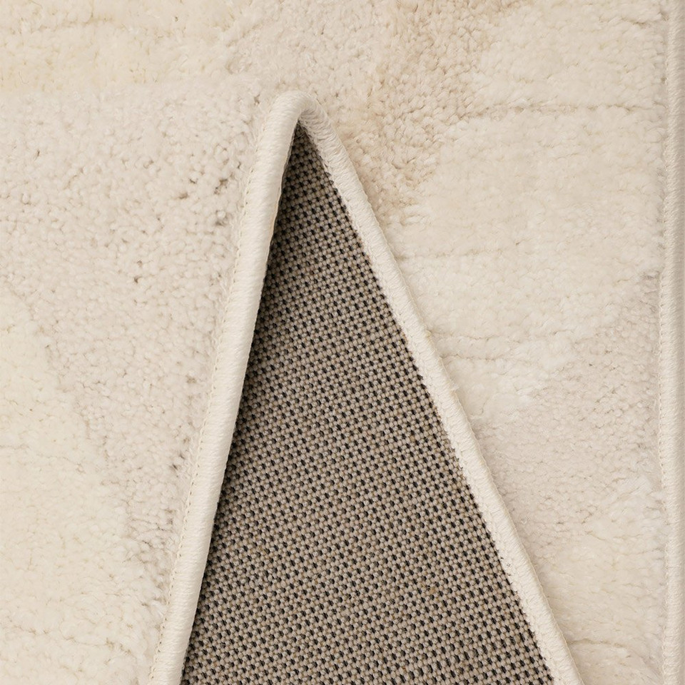 Ava Wave Cream Rug folded