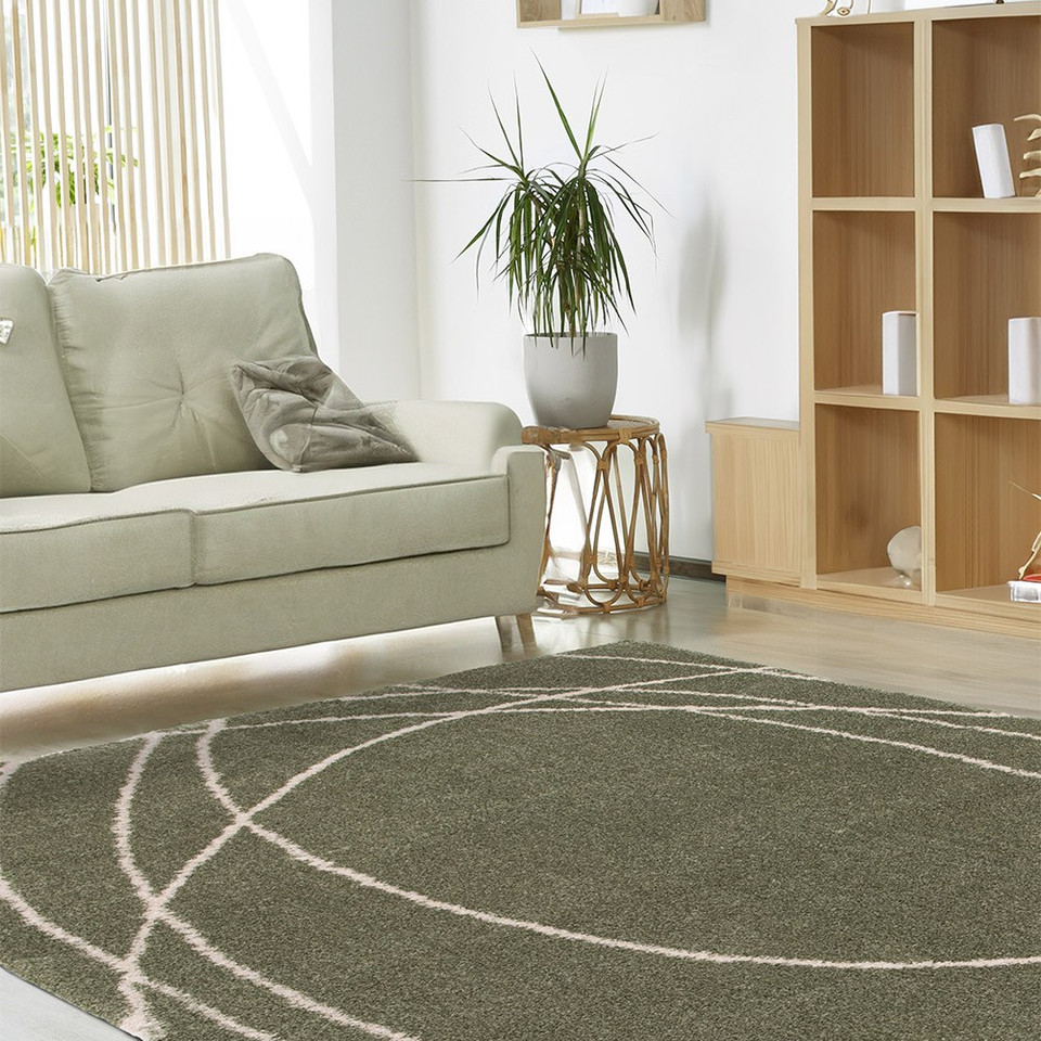 Halo Squiggle Sage Green Rug in a living room