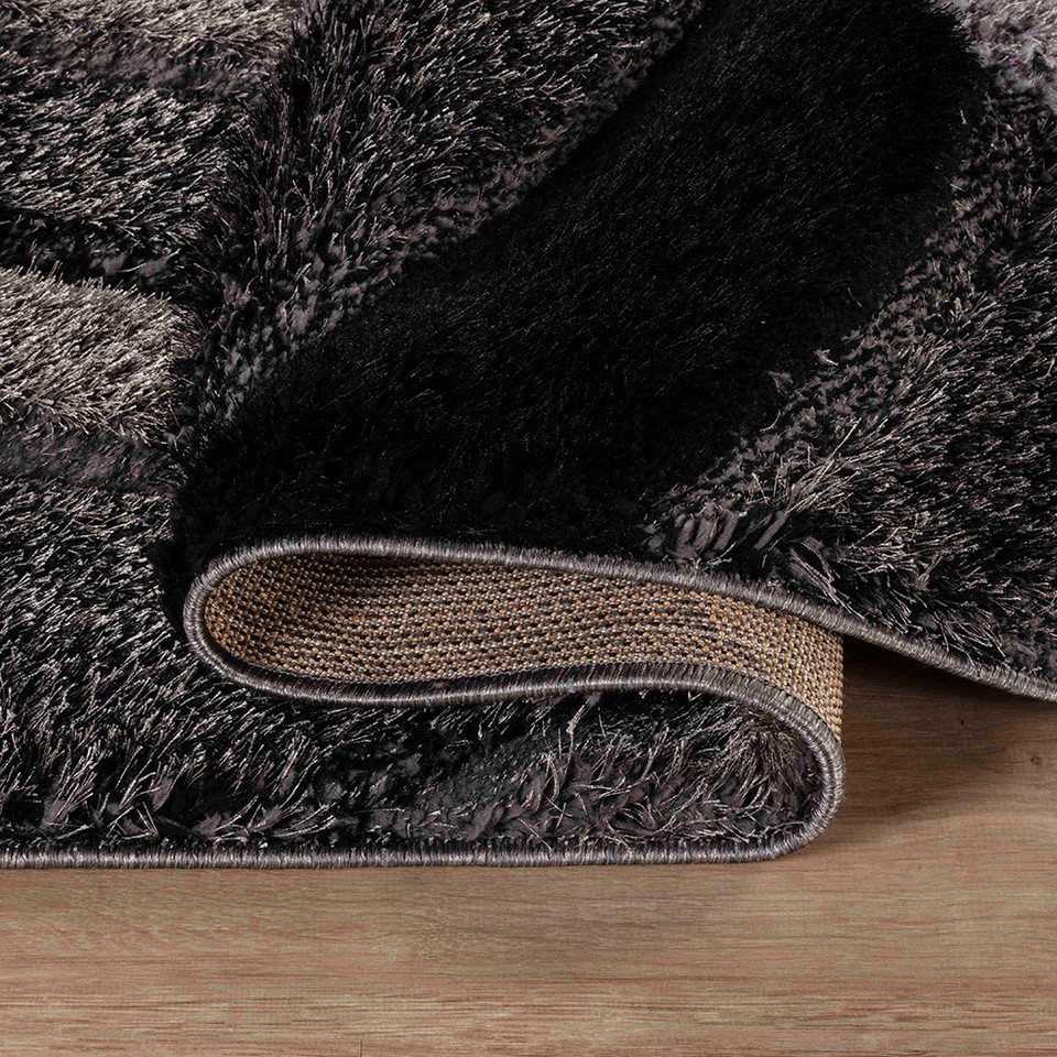 grey shaggy rug folded