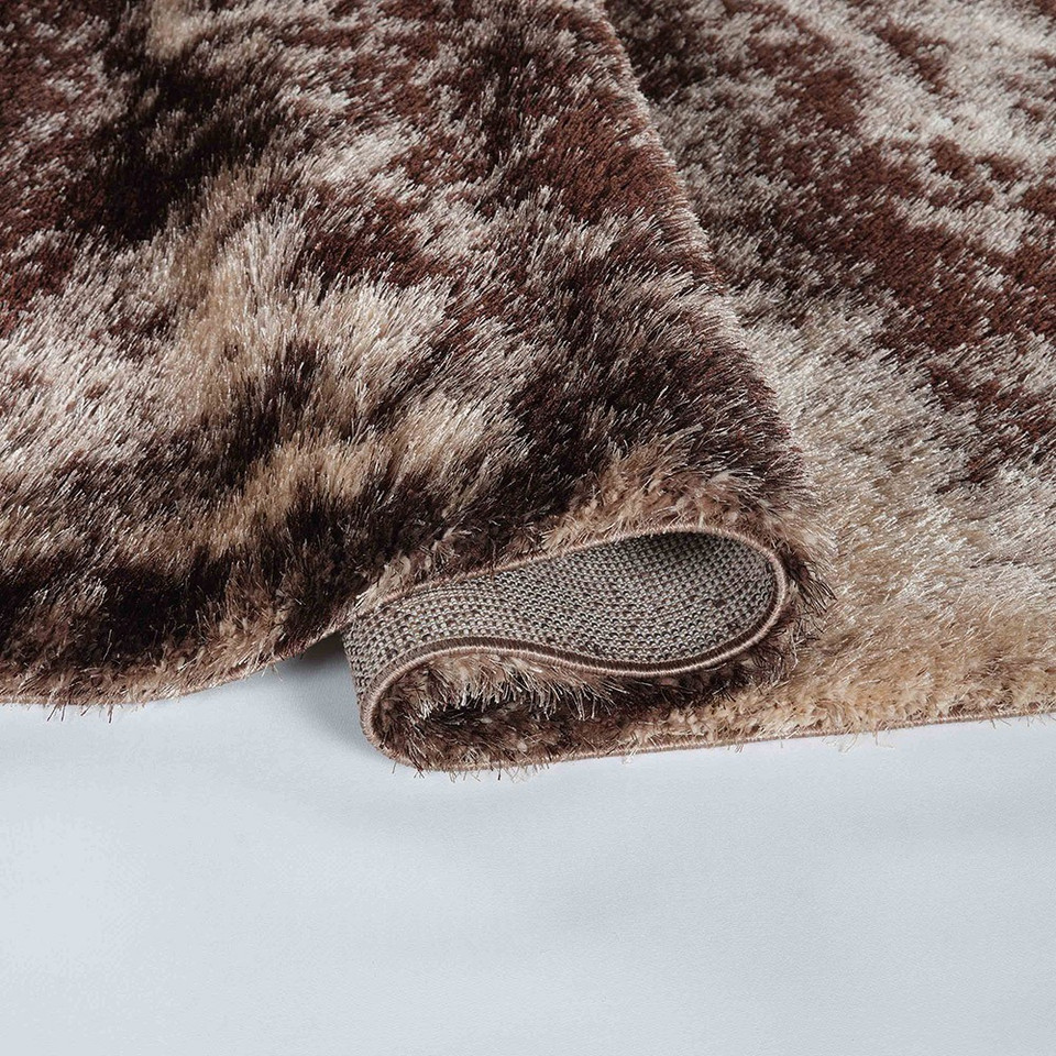 bronze shaggy rug folded