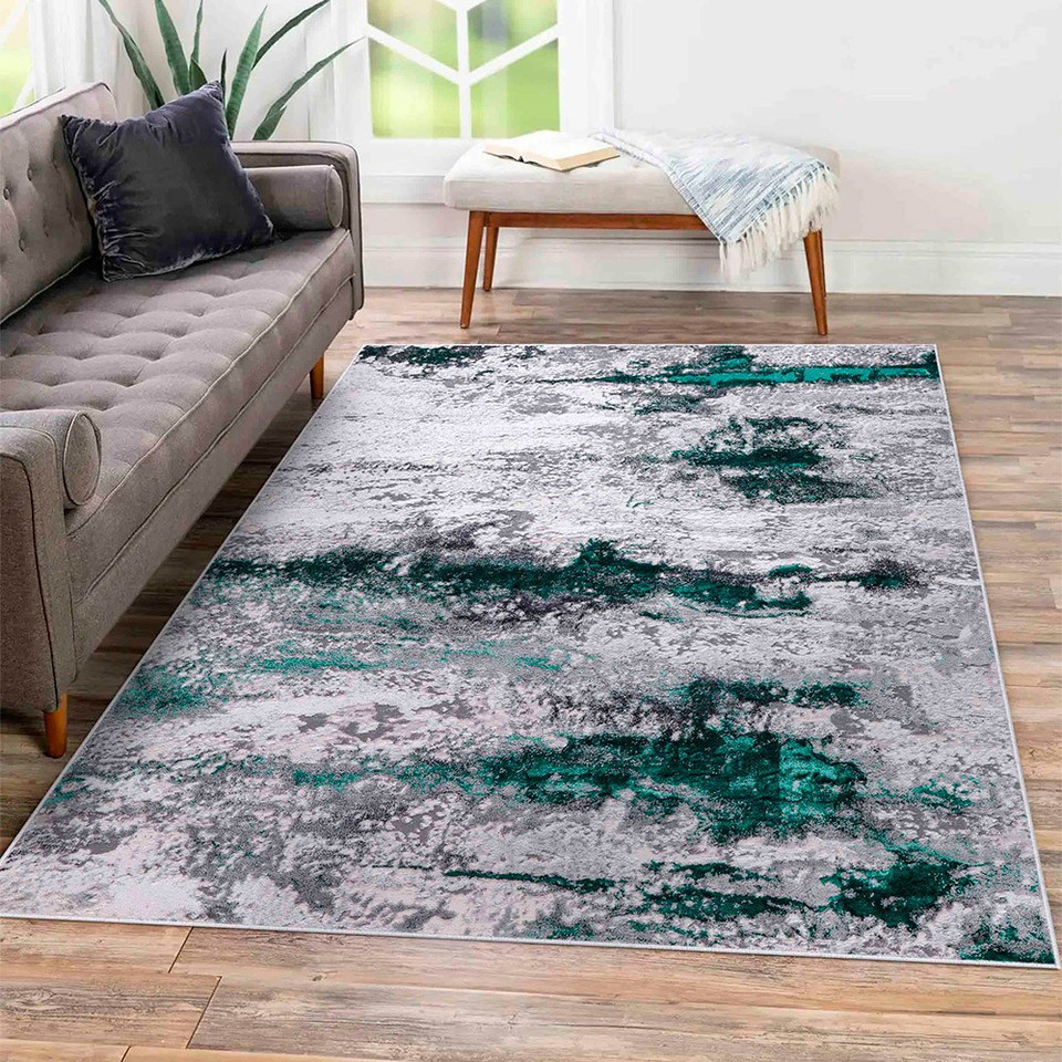 aqua grey abstract rug in a living room