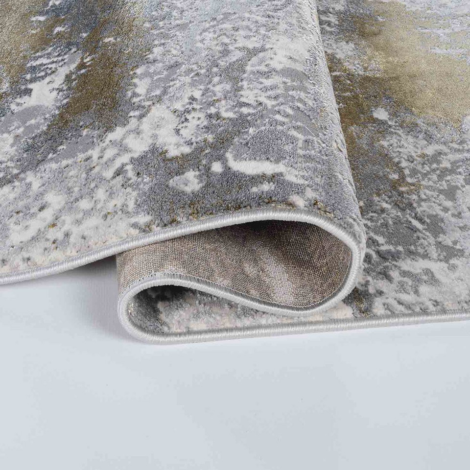 gold grey abstract rug folded