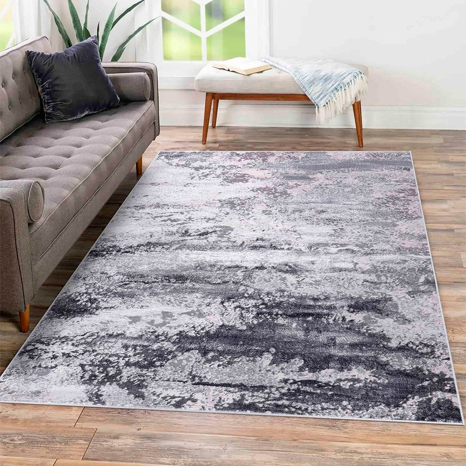 silver grey abstract rug in a living room