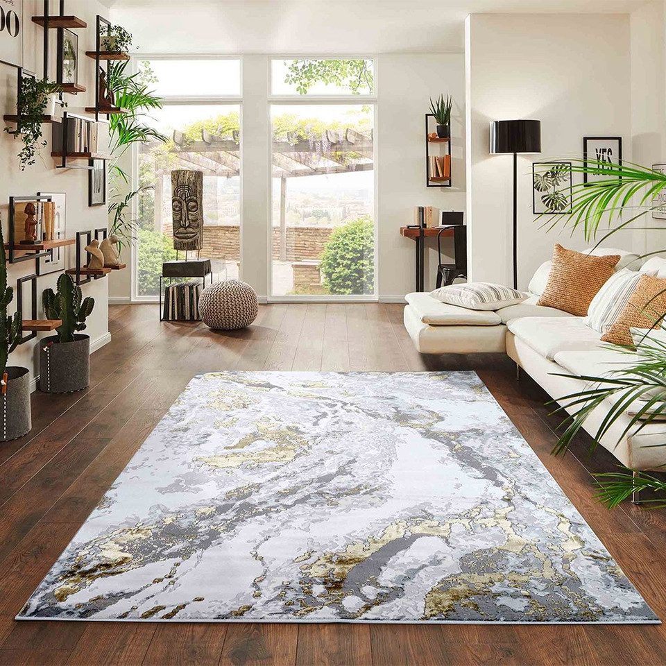 gold grey abstract rug in a living room
