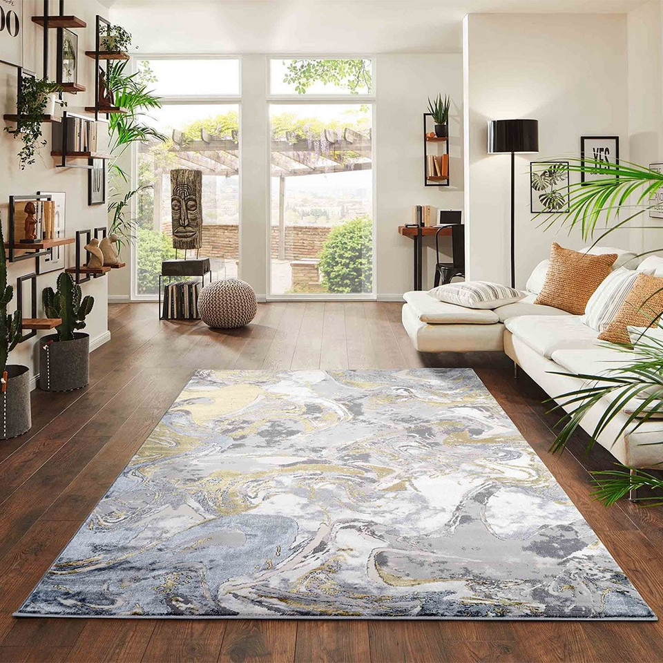 gold grey abstract rug in a living room
