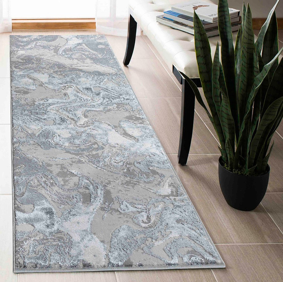 silver abstract rug runner in a hallway