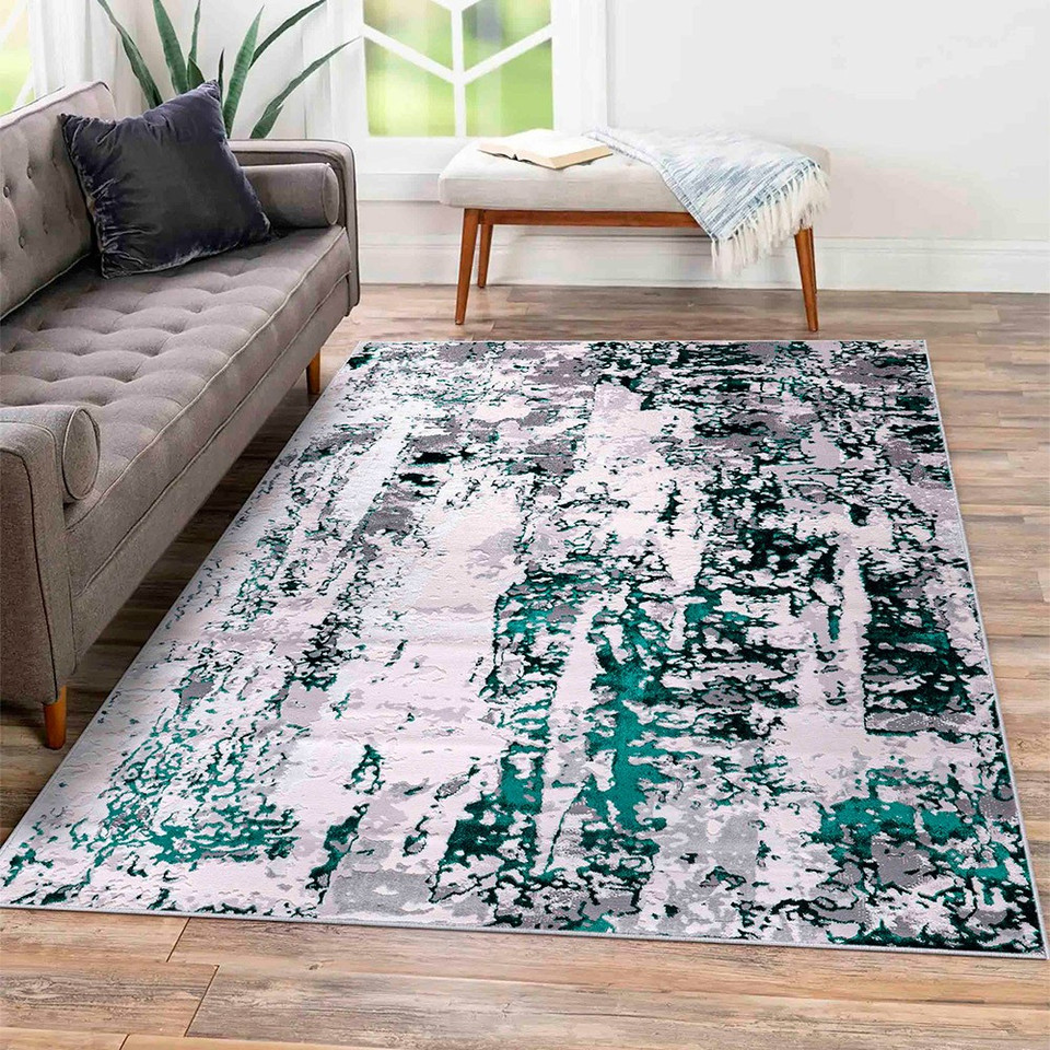 aqua grey abstract rug in a living room