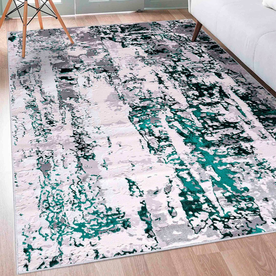 aqua grey abstract rug in a living room