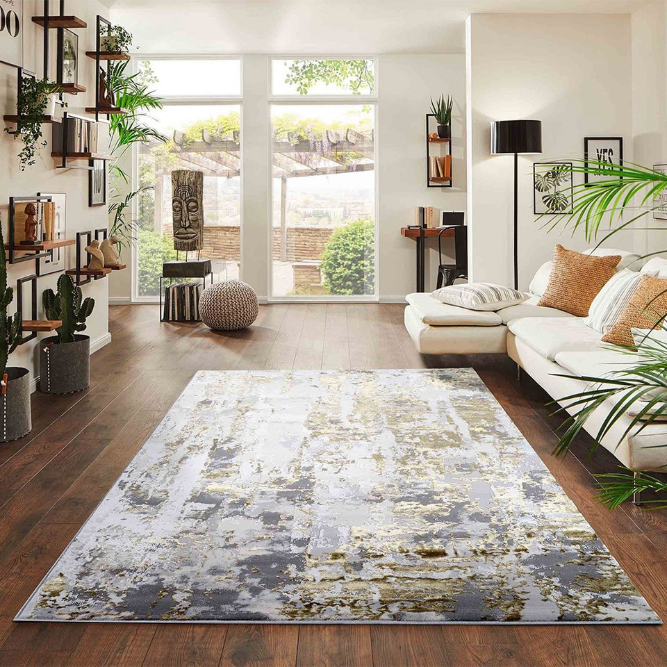 gold grey abstract rug in a living room