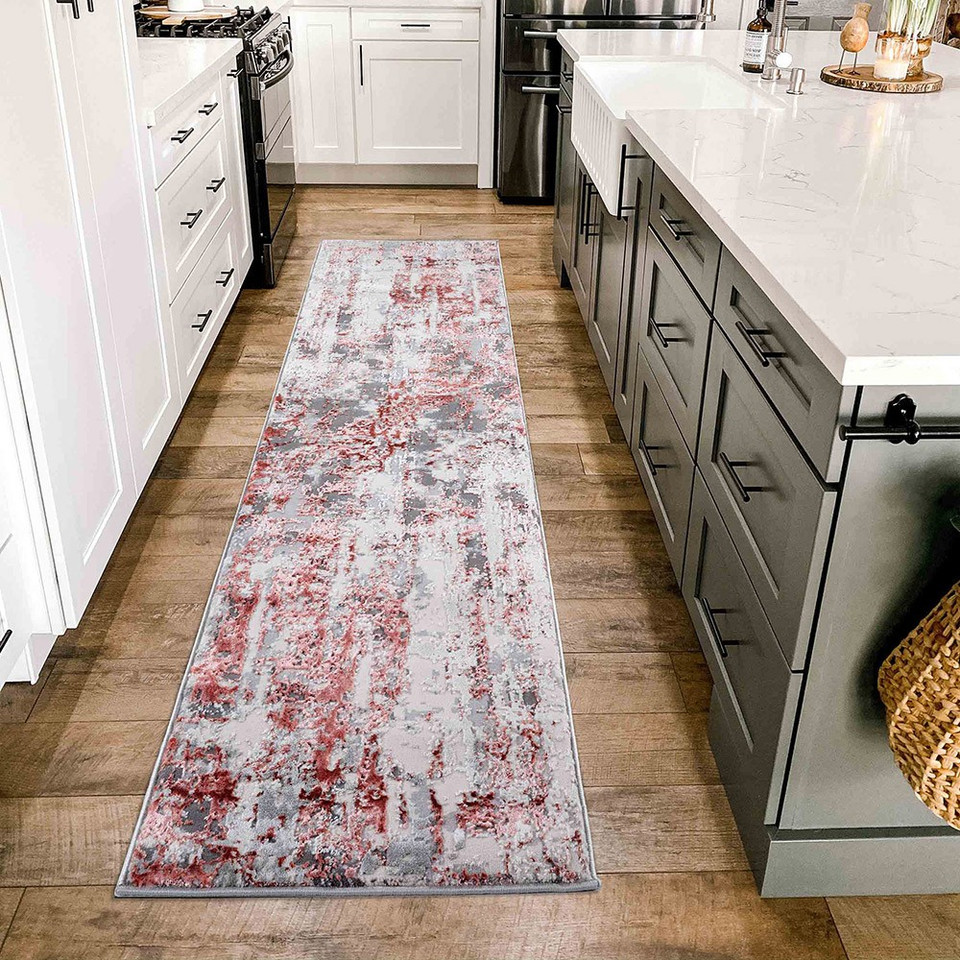 pink grey abstract rug runner in a kitchen