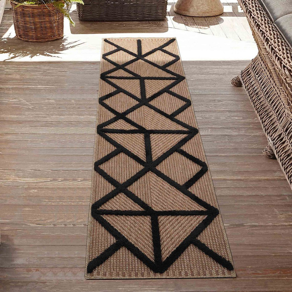 black natural geometric rug runner outdoors on decking