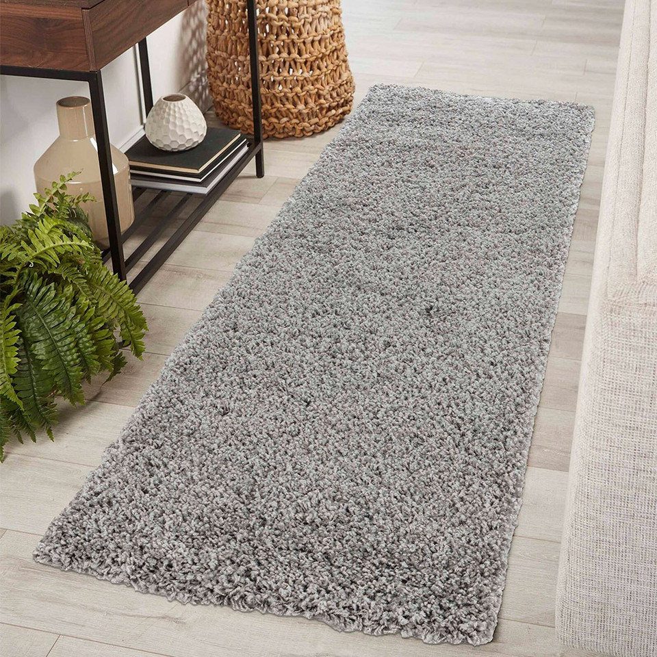 plain shaggy grey rug runner in hallway