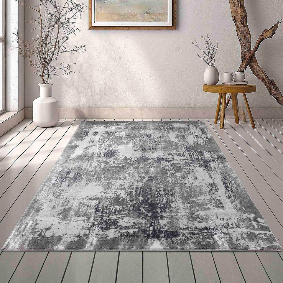 modern abstract acrylic grey rug in a living room