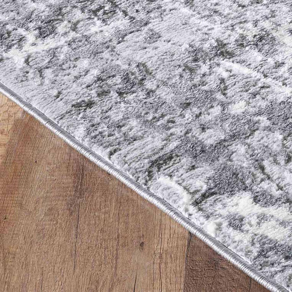modern abstract lines grey rug runner closeup edge on wooden floor