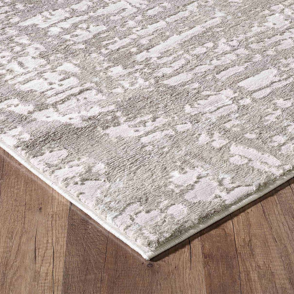 modern abstract lines stone rug closeup corner on a wooden floor