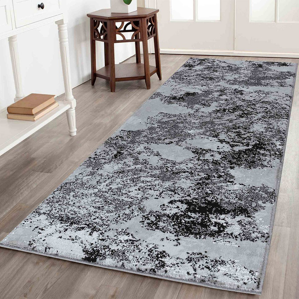 modern abstract sprayed black rug runner in a hallway