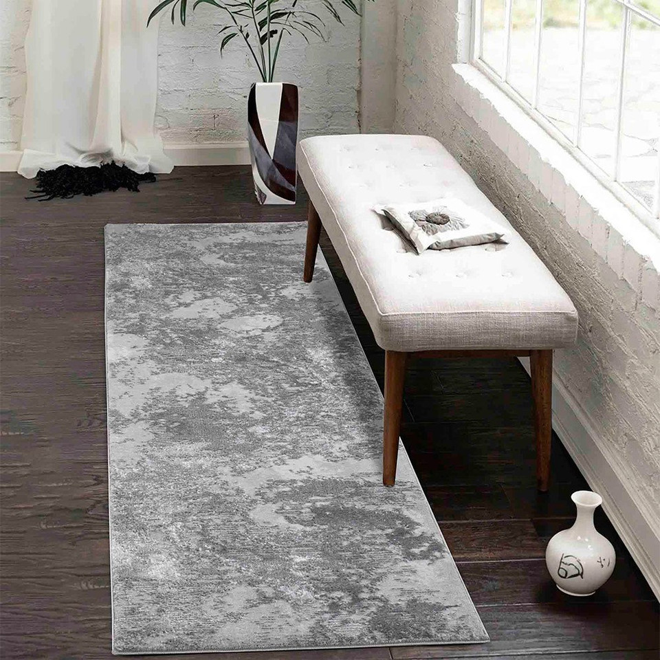 modern abstract sprayed grey rug runner in a hallway