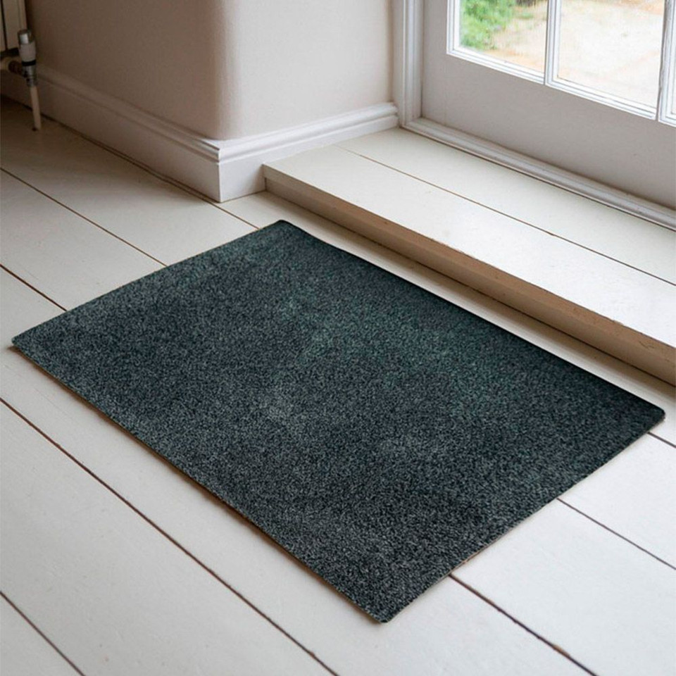 anthracite dirt trapper doormat in a doorway