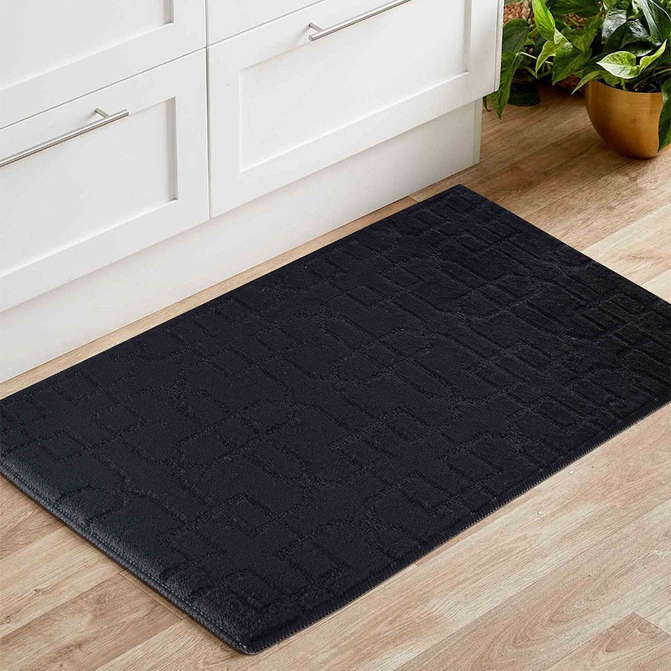 cubed trellis black doormat in a living room