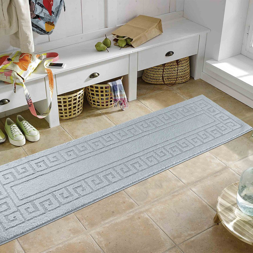 greek key silver doormat runner in a living room