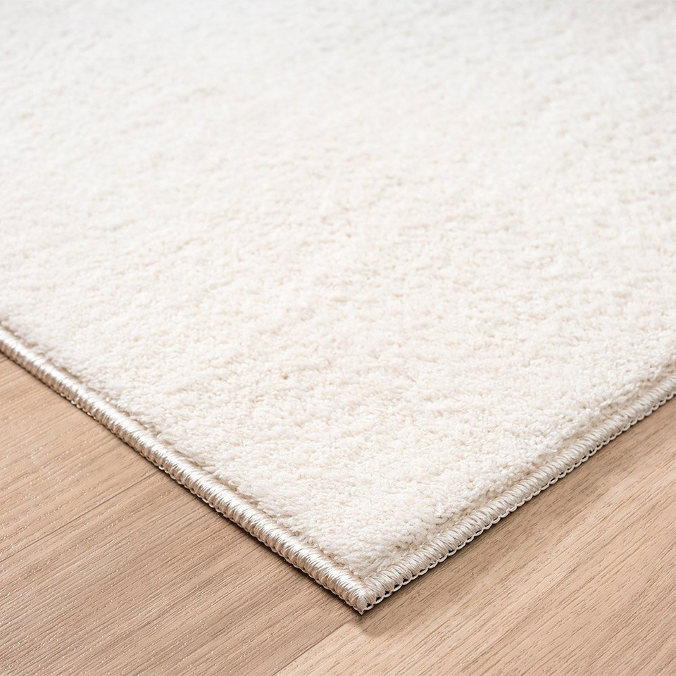 plain white rug runner side view of corner
