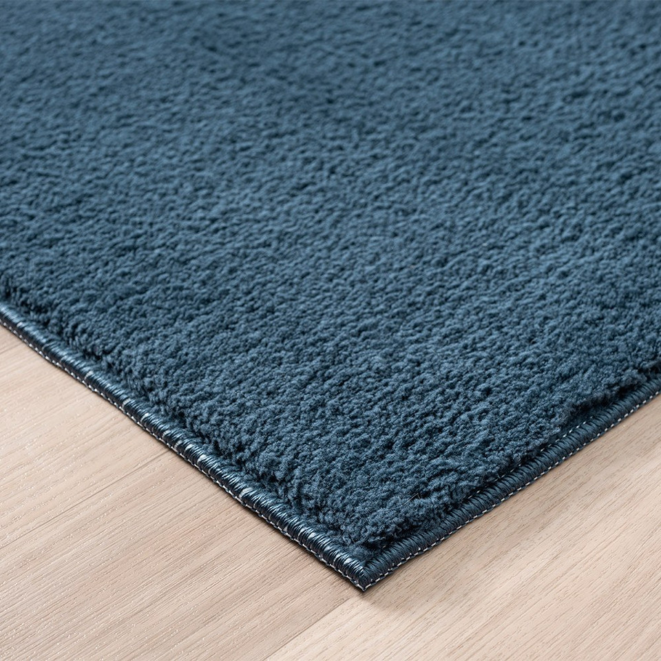 plain navy rug runner side view of corner
