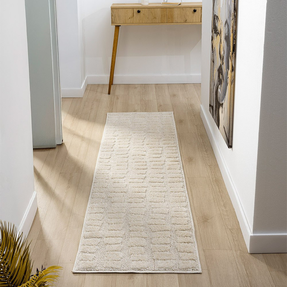 cobble cream rug runner in a hallway