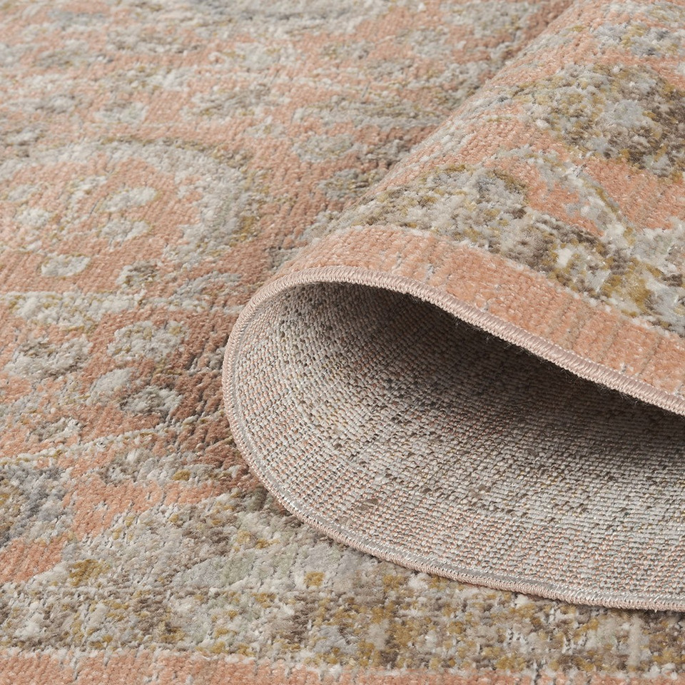 traditional floral coral rug runner closeup rolled