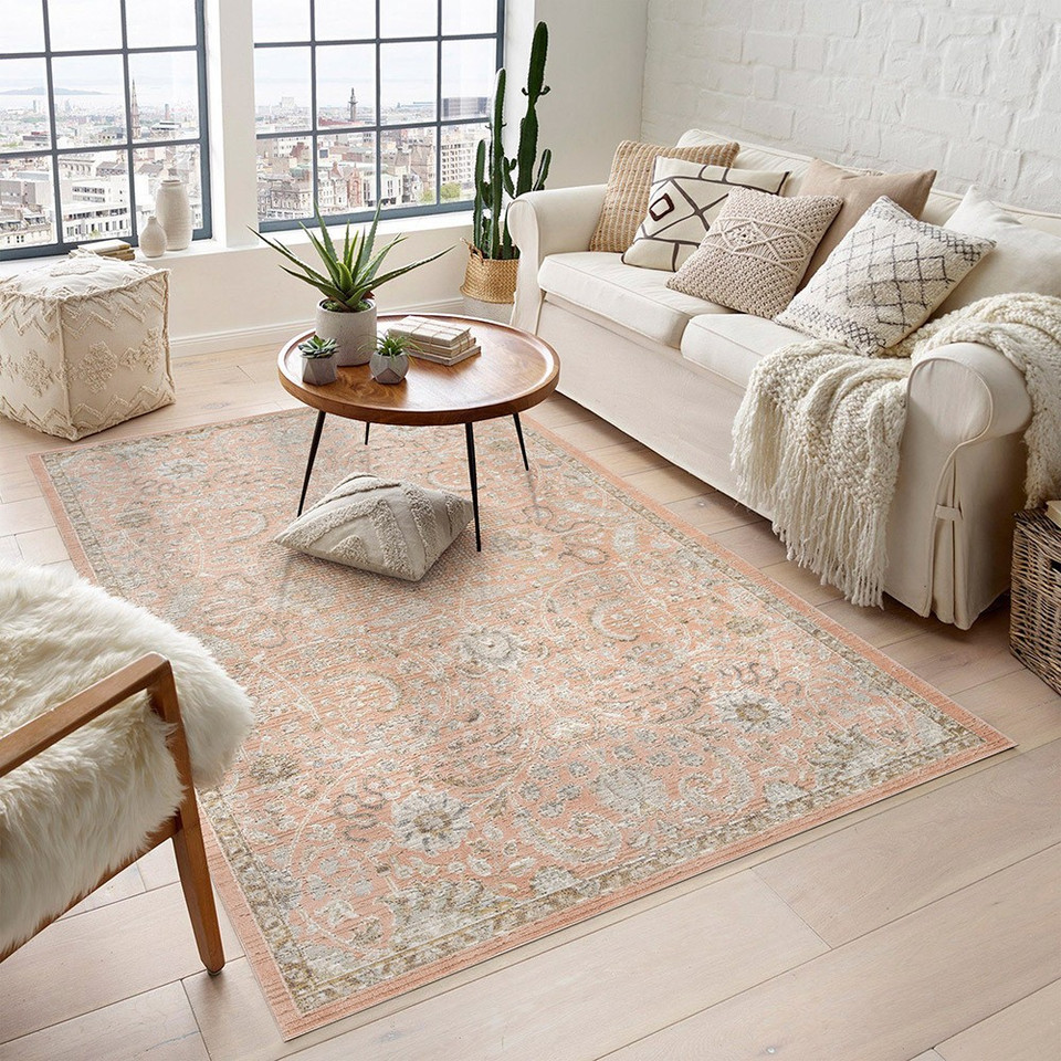 traditional floral coral rug in a living room