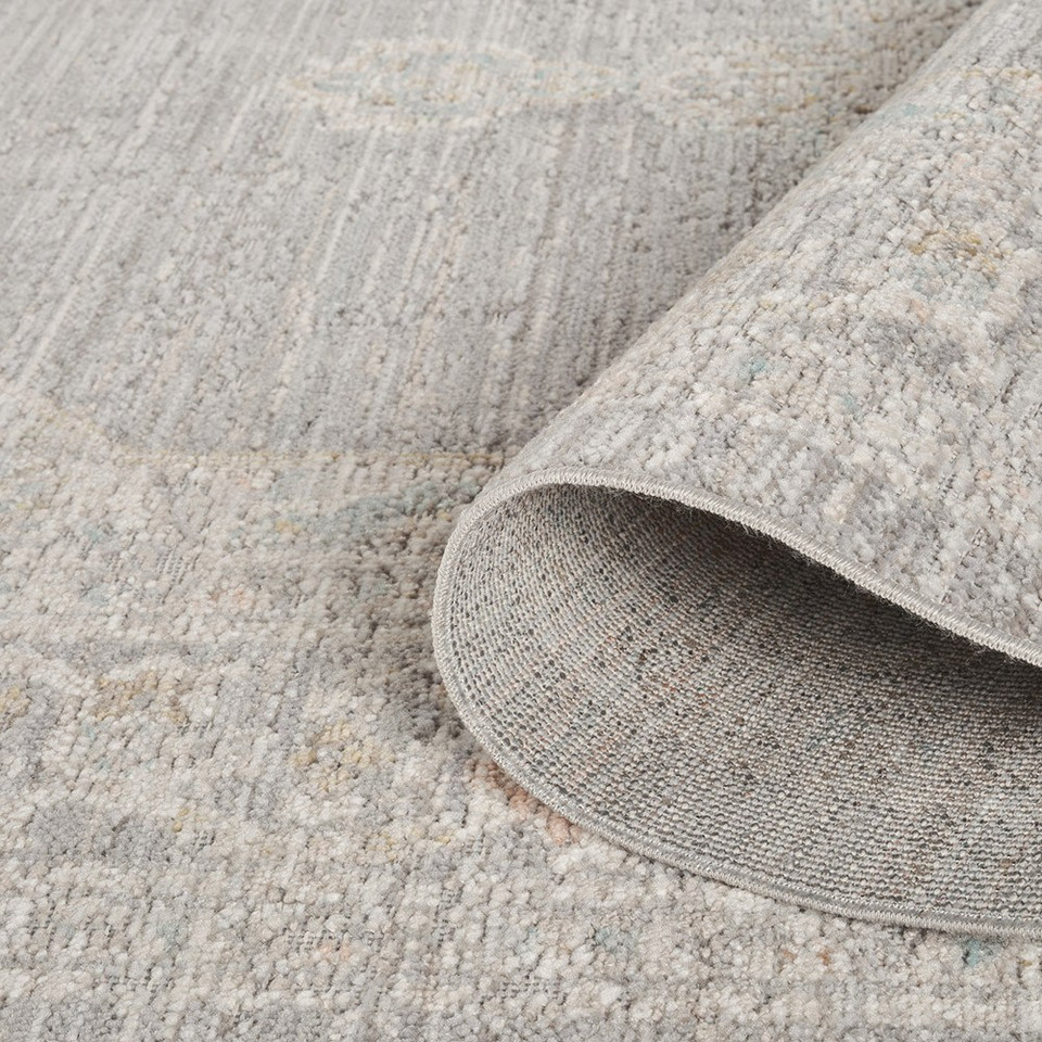 traditional floral grey rug runner closeup rolled