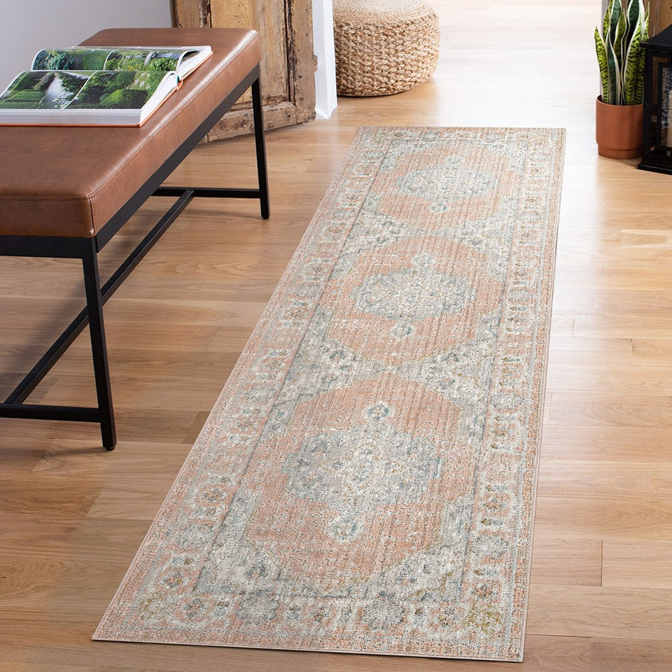 traditional floral coral rug runner in a hallway