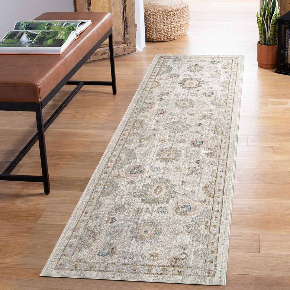 traditional beige rug runner in a hallway