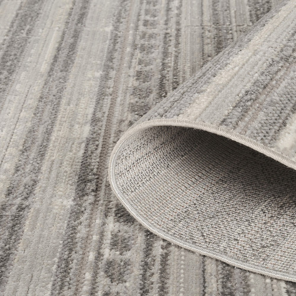traditional grey rug runner closeup rolled