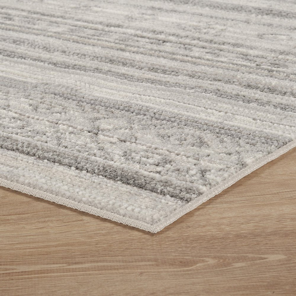 traditional grey rug side angle closeup corner