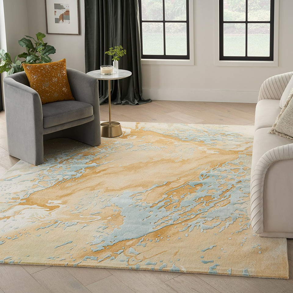 sand blue abstract rug in a living room with furniture