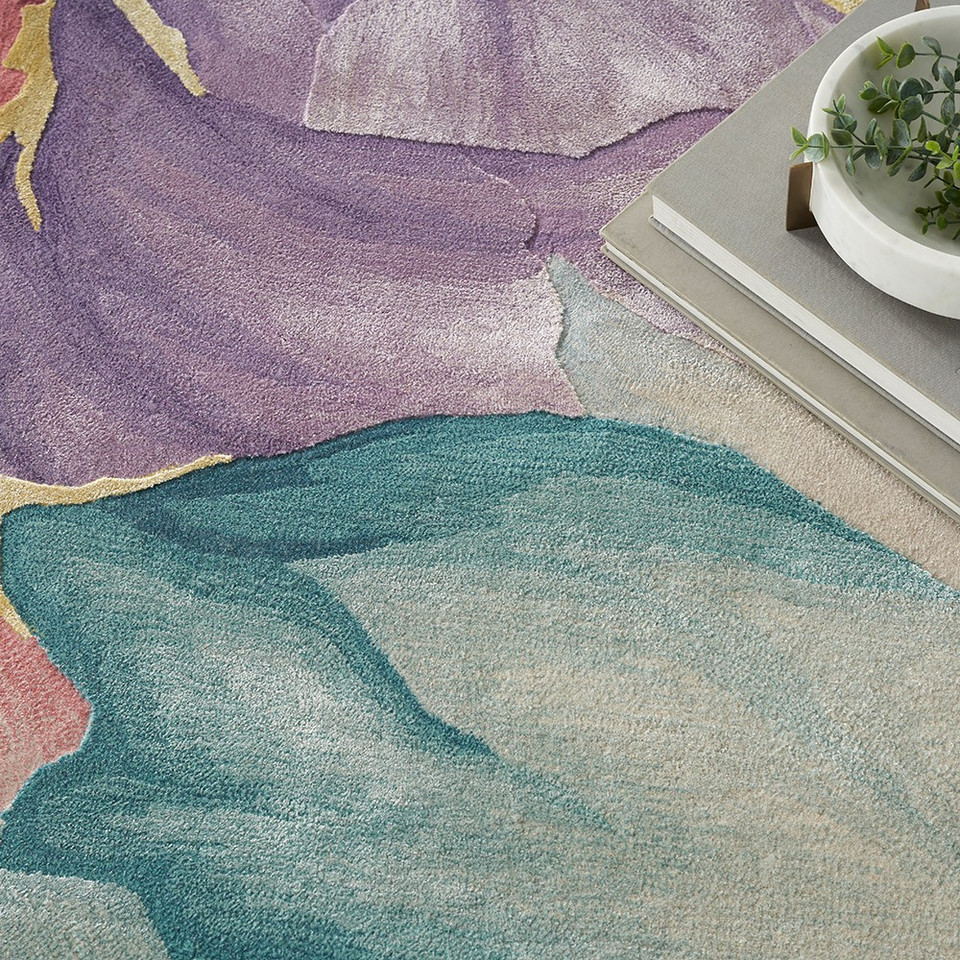 ivory floral rug closeup pattern with a plant