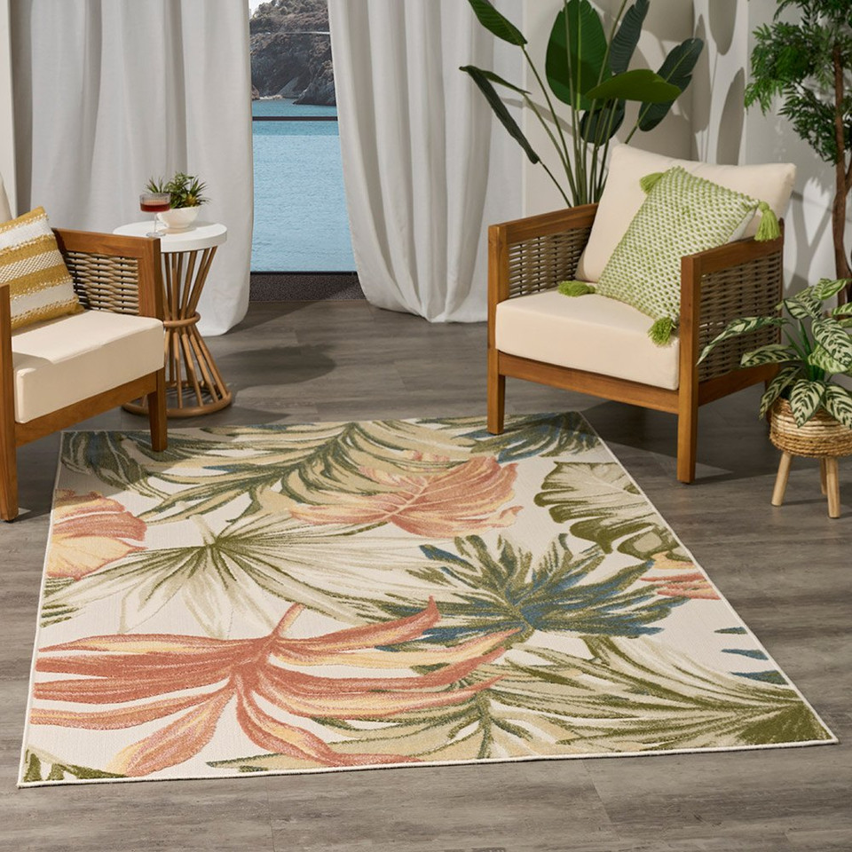 floral ivory green rug indoors dark setting