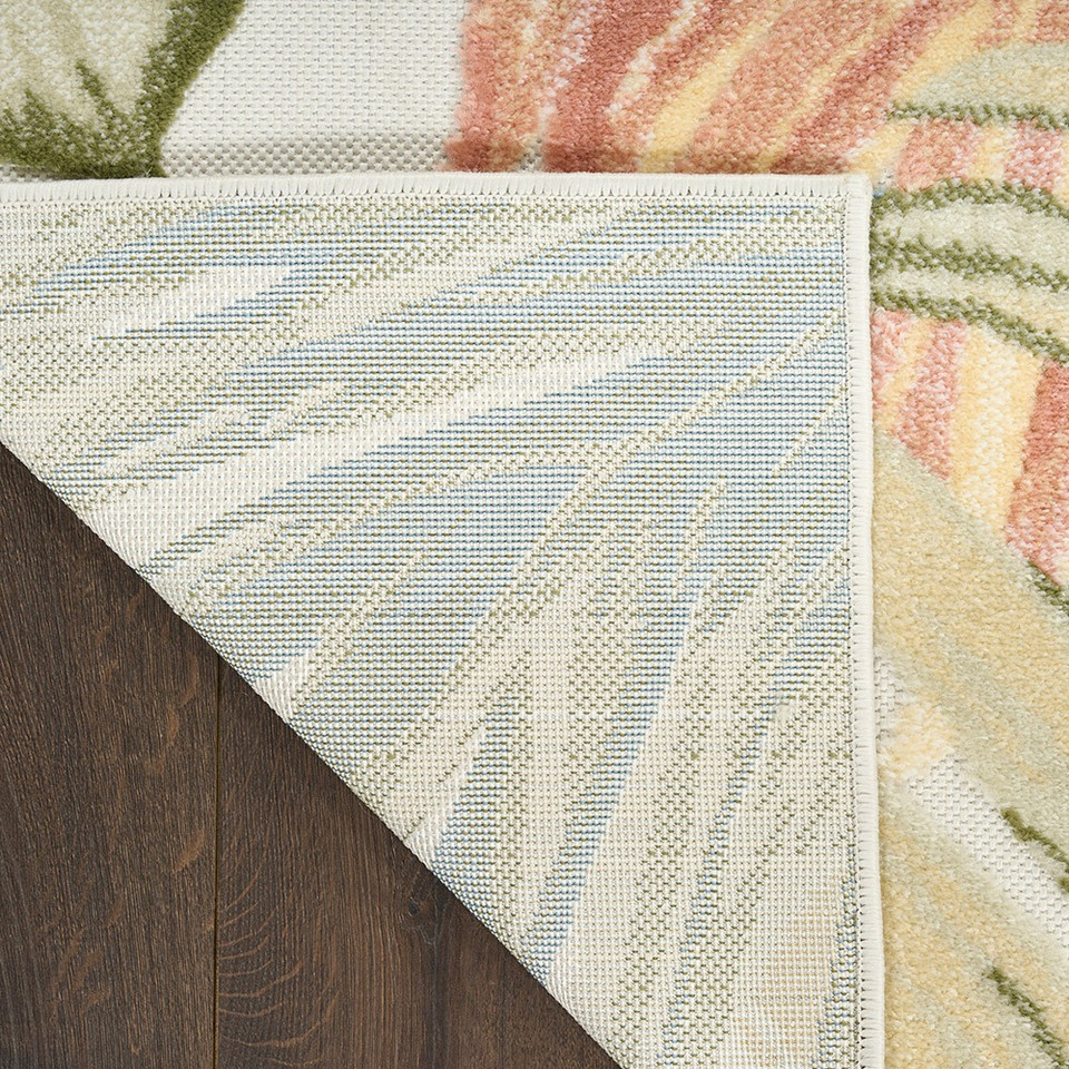 floral ivory green rug closeup corner fold