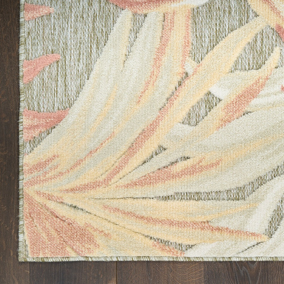 floral sage rose rug closeup corner on dark wood floor