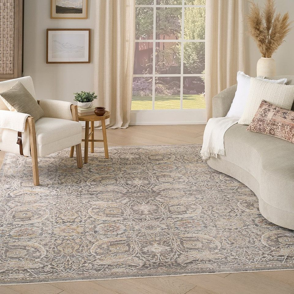 charcoal traditional rug in a living room with natural decor