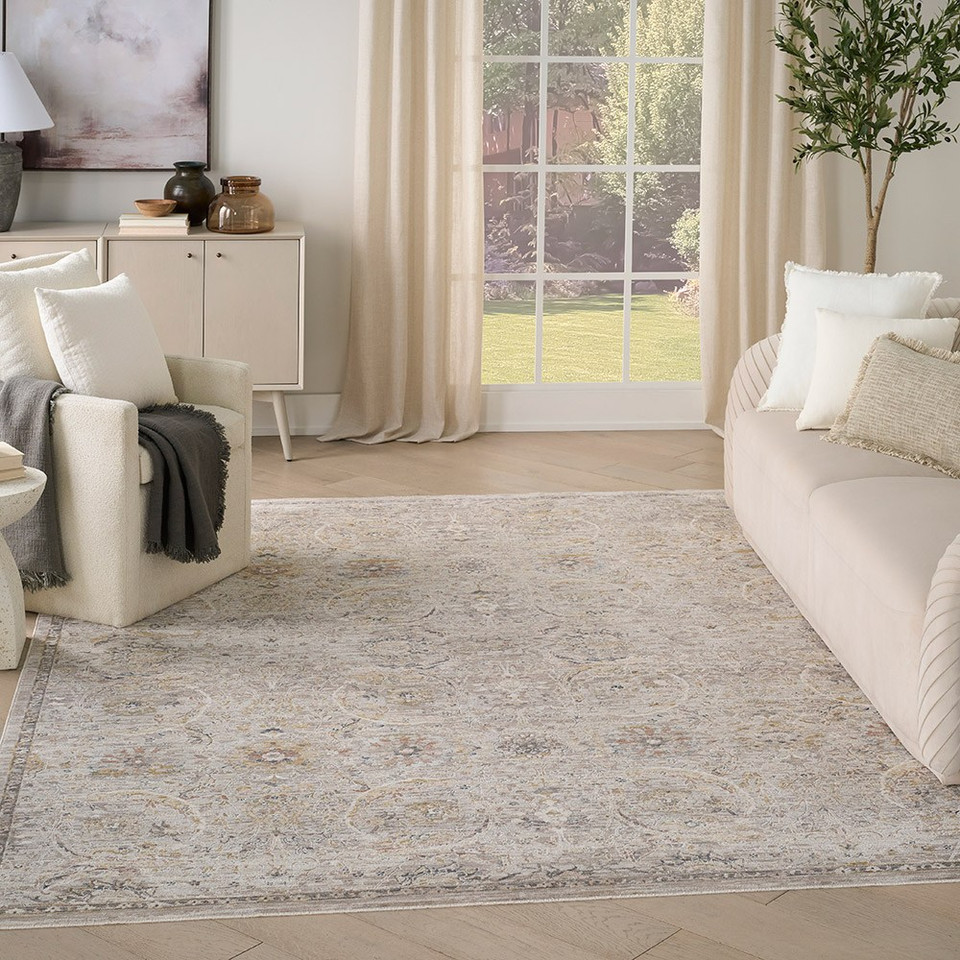 grey traditional rug in a living room with cream decor
