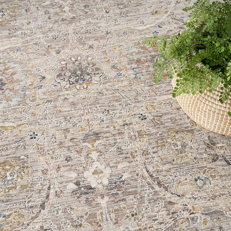 grey traditional rug closeup pattern with plant pot