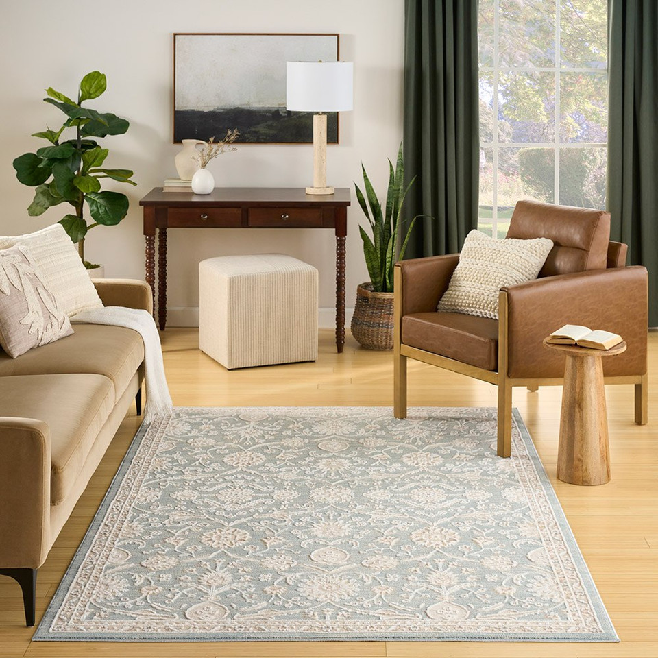 blue traditional rug living room with natural decor