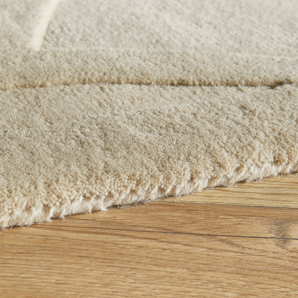 beige wool rug closeup edge