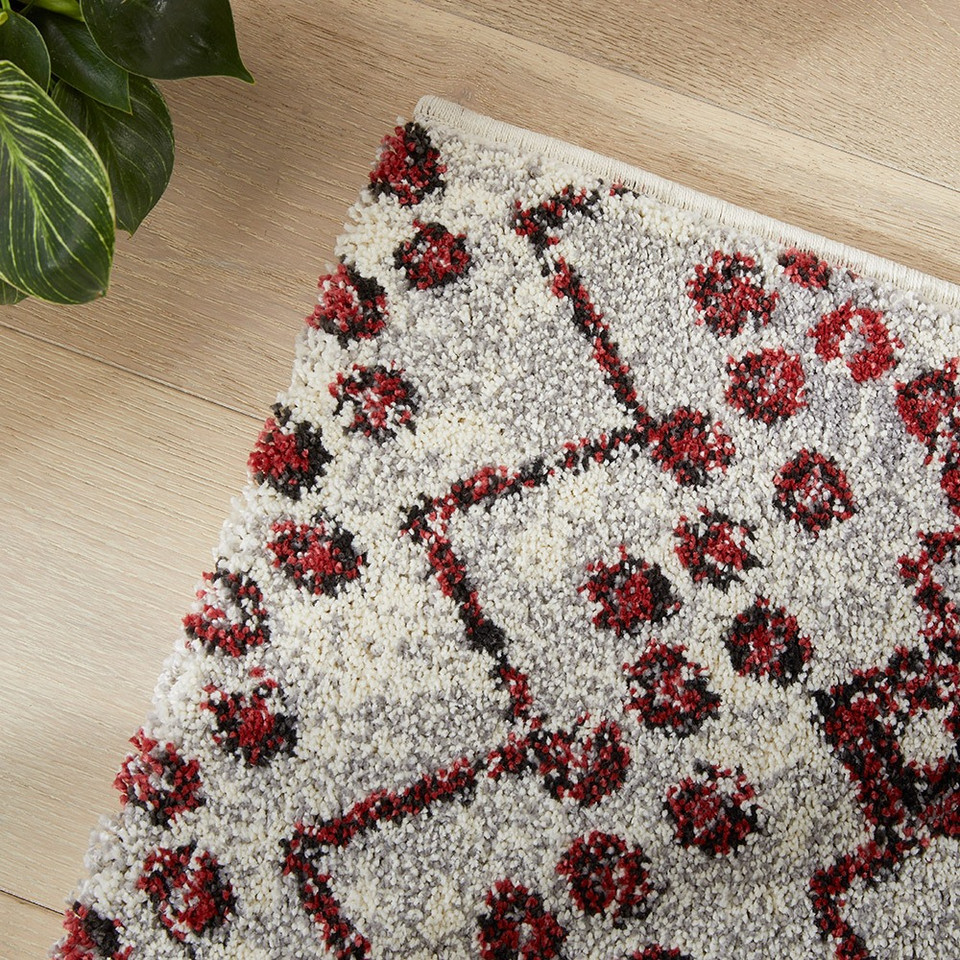 terracotta geometric rug closeup corner