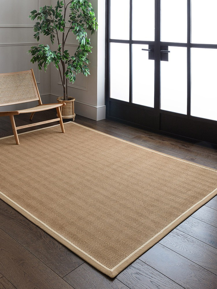 linen cream jute rug in a living room with matching decor