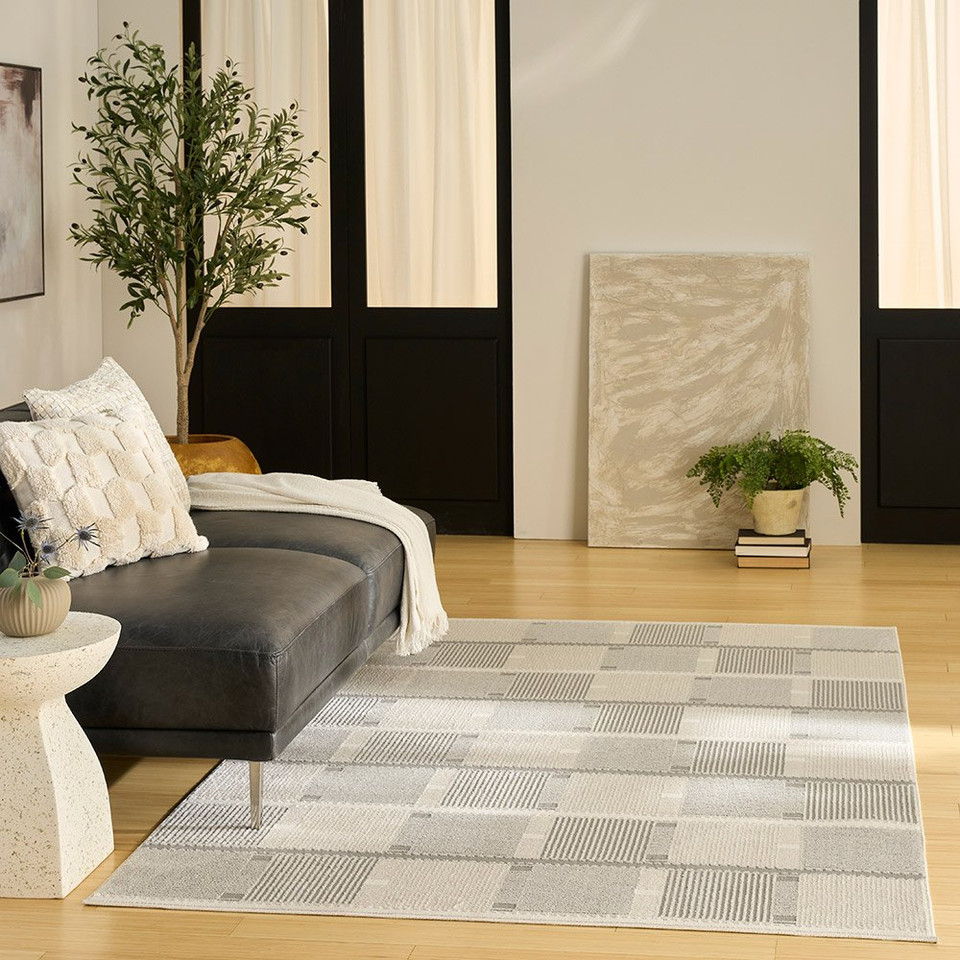 ivory grey geometric rug in a living room
