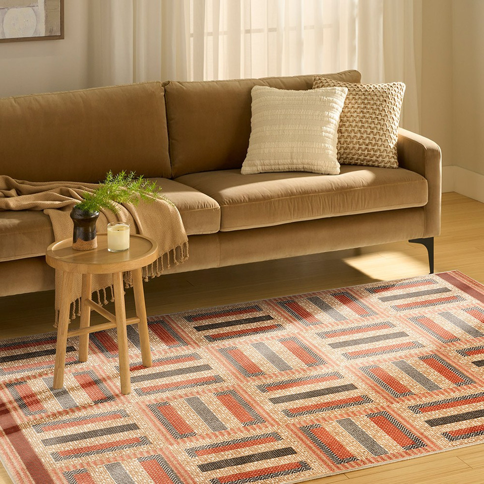 multi geometric rug in a living room