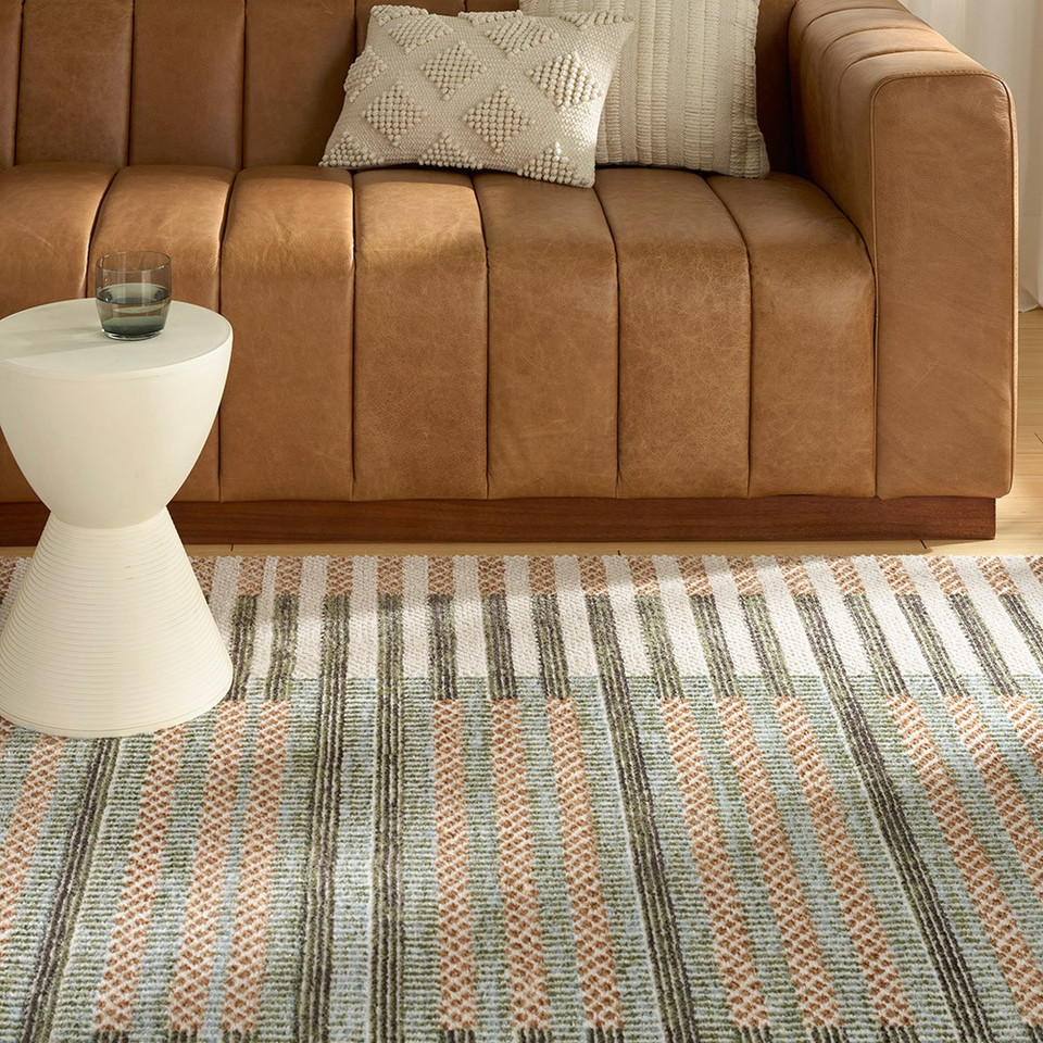 ivory multi geometric rug in a living room