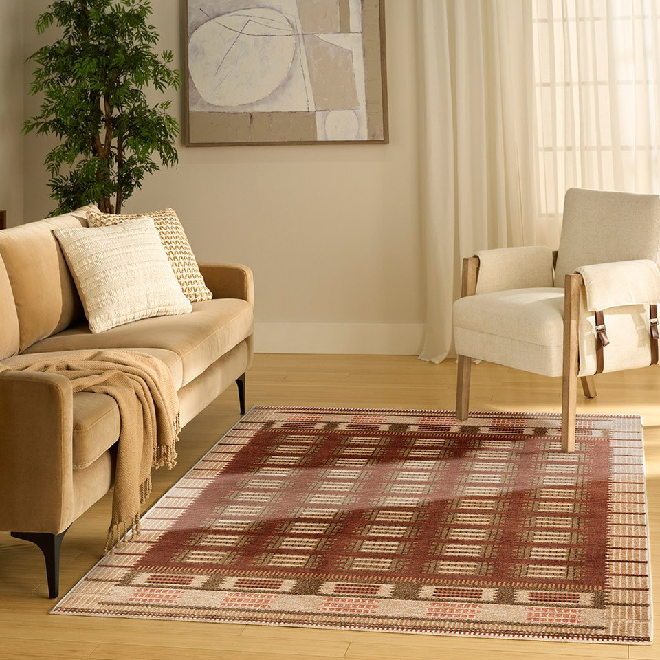 rust geometric rug in a living room